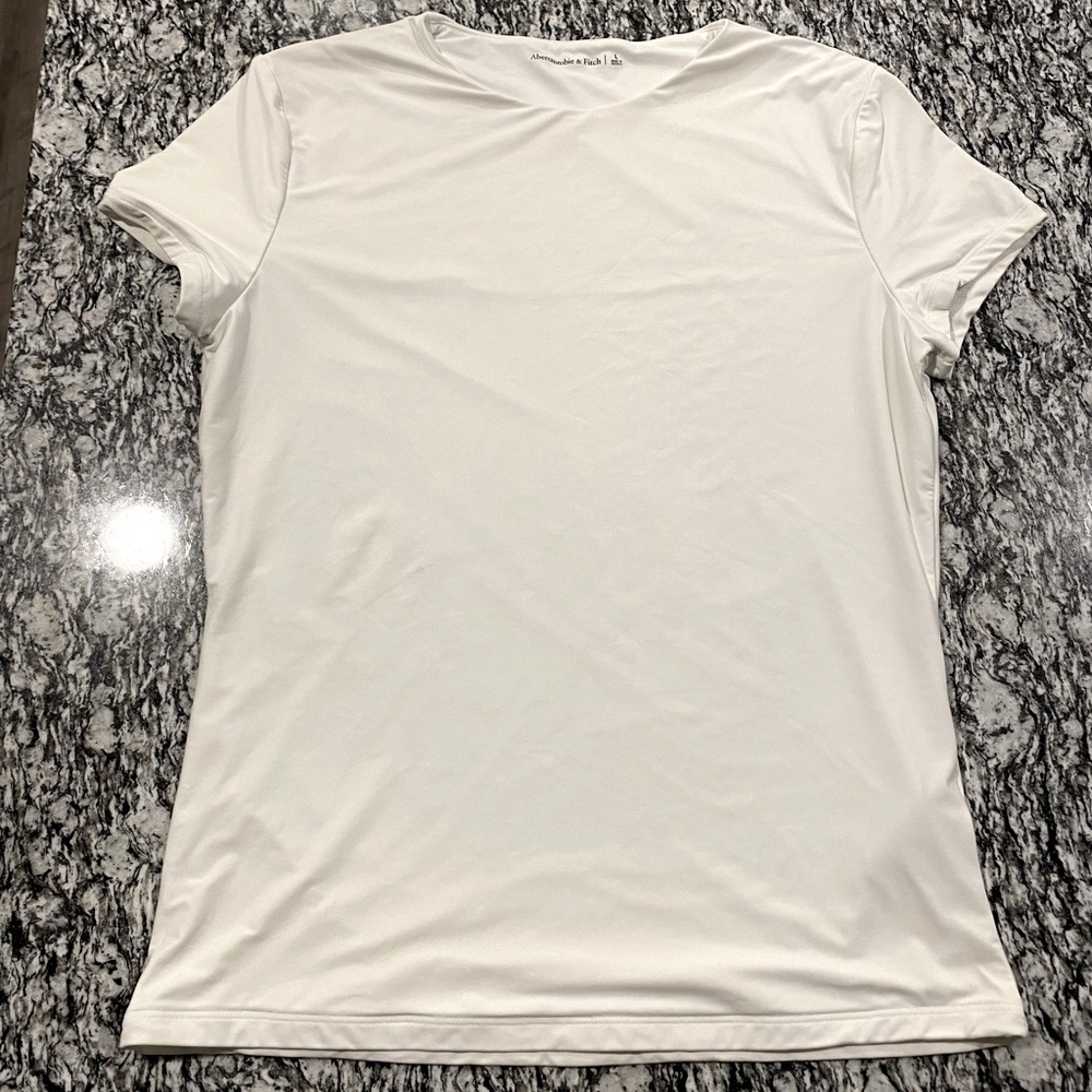 Soft Matte Seamless Tuckable Baby Tee in White